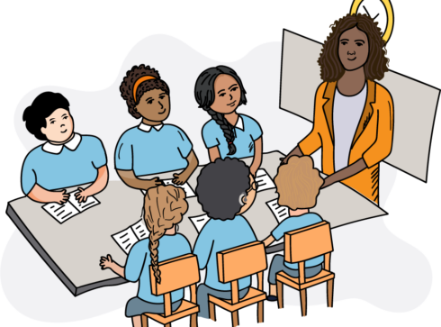 Teacher in an orange jacket stood in front of a board and clock speaking to a class of six children seated at a desk.